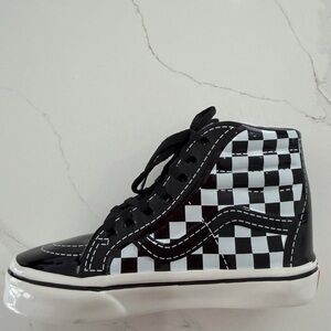 Vans Black and White Checkered High-Top Sneaker Piggy Bank.